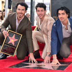 The Jonas Brothers на Аллее Славы в Голливуде