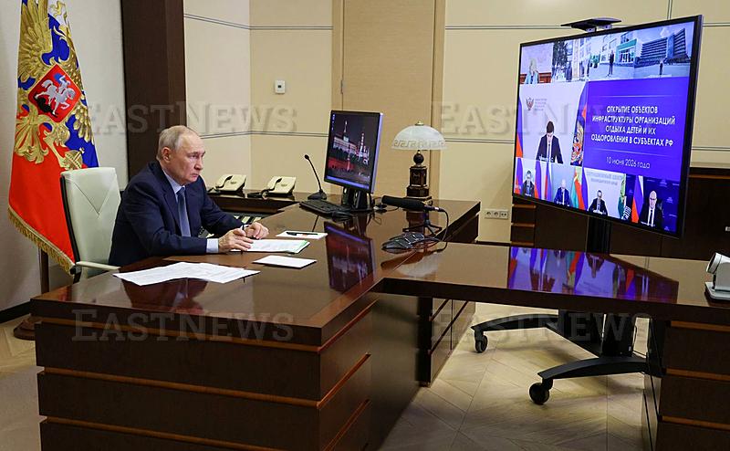 Russian President Vladimir Putin chairs a videoconference meeting with members of the government in Moscow