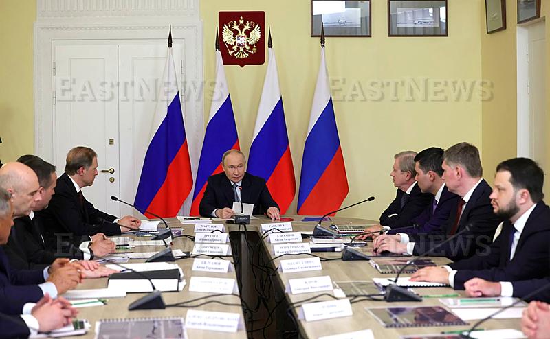 Russian President Vladimir Putin chairs a meeting on developing the domestic aviation industry at the Gromov Flight Research Institute in Moscow